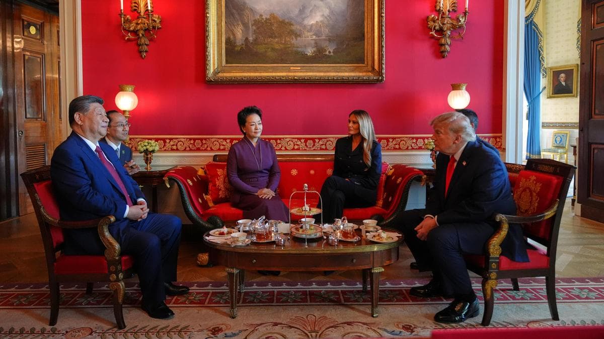 US President Donald Trump and Chinese President Xi Jinping seated with their spouses during a meeting at the White House.
