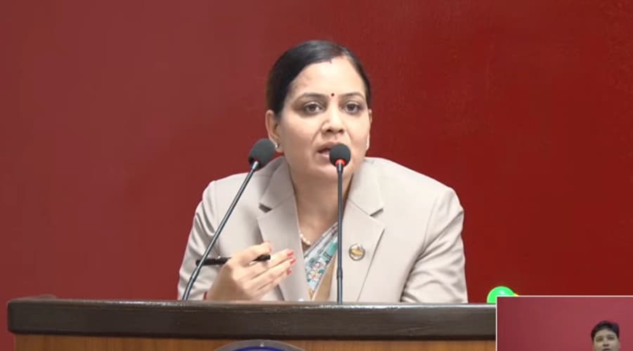 Minister for Health and Food Hygiene Nisha Mehta speaking at a press conference.