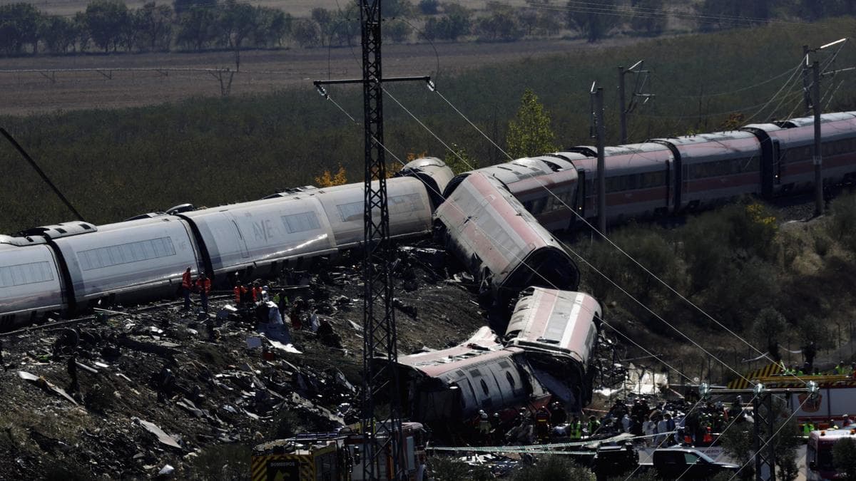 An aerial view of the train crash site showing multiple derailed carriages.