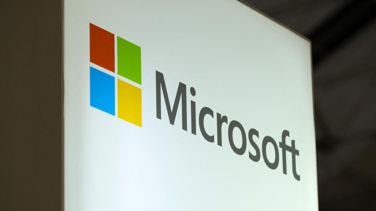 A close-up of the Microsoft logo on a sign.