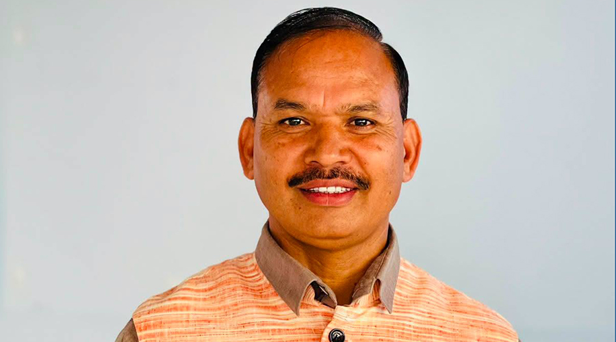 Nepali Congress leader Manoj Mani Acharya smiling in a portrait.