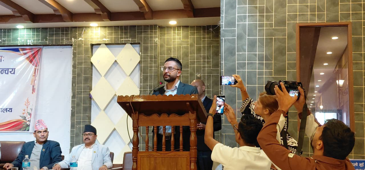 A speaker at a podium during the education conference in Hetauda.