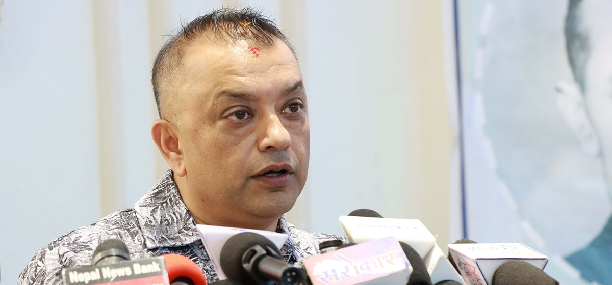 Gagan Thapa speaking at a press conference.